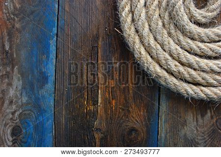 Nautical Background For Your Design. Nautical Rope On Old Wooden Deck.