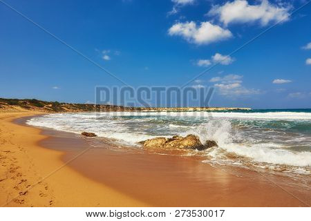 Beautiful Wild Beach With Clear Turquoise Water And Waves. Lara Beach, Cyprus.