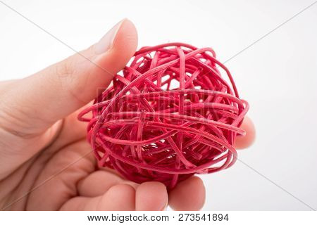 Roll Of Colotful String In The Hand