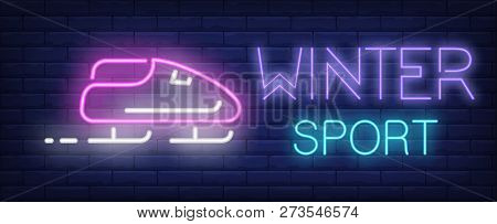 Winter Sport Neon Sign. Glowing Inscription With Pink Bobsleigh On Brick Wall Background. Vector Ill