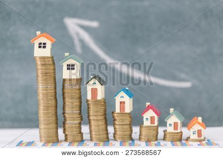 Mini House On Stack Of Coins,money And House, Real Estate Investment, Save Money With Stack Coin, Mo