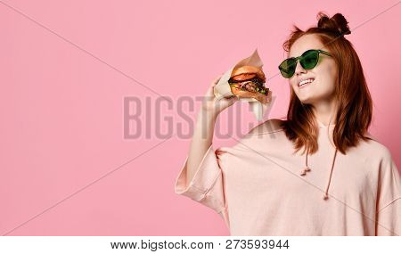 Positive Ginger Young Woman Pose For Selfie, Use Modern Cell Phone, Sit With Burger In Hand , Have F