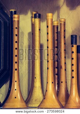 Dozens Of Handmade Wooden Flutes Or Shrill Pipe