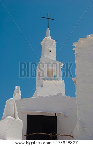 White Tower And Chimneys Of The Little Fisherman Town Of The Spanish Island