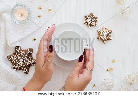 Woman Hands Hold Empty White Cup. Christmas Gingerbread.