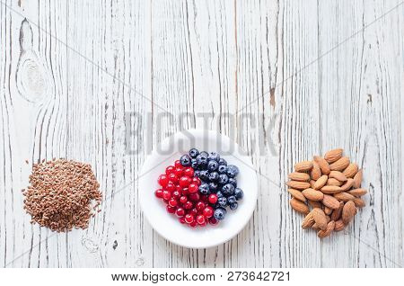 Fletley From Healthy And Wholesome Food. Namely, These Are Berries, Sesame And Migdal.