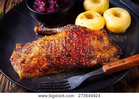 Classic And Crispy Roasted Duck With Cabbage And Dumplings