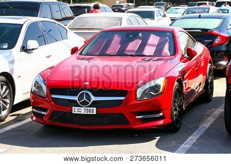 Dubai, Uae - November 15, 2018: Red Motor Car Mercedes-benz R231 Sl-class In The City Street.