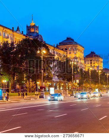 Evening Cityscape With Traffic On Road Of Illuminated Downtown Khreshchatyk Street, Kiev, Ukraine