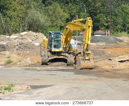 One Track-type Excavator On Ground At Day