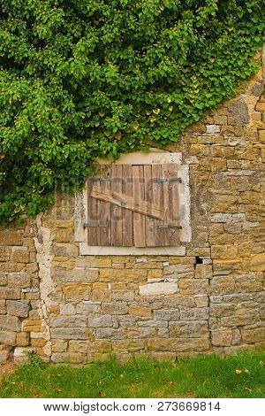 An Old Window In The Historic Hill Village Of Oprtalj In Istria, Croatia