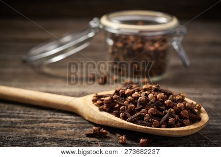 Dried Cloves In A Wooden Shovel Close-up