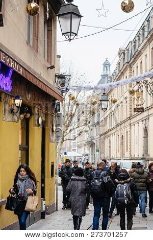 Strasbourg, France - Dec 11, 2018: Rear View Of French Police Officers Securing Rue De Loutre City C