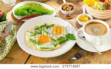 Breakfast Or Brunch Table Filled With All Sorts Of Delicious Delicatesse