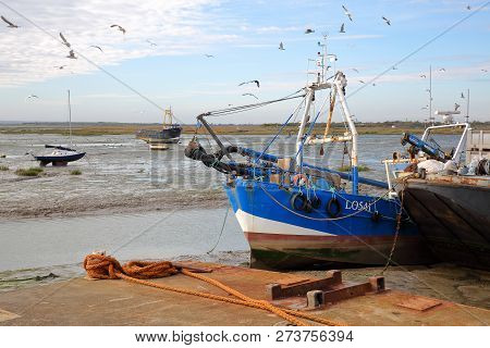 Leigh On Sea, Uk - November 3, 2018: Colorful Fishing Boats Moored At The Quay With Seagulls