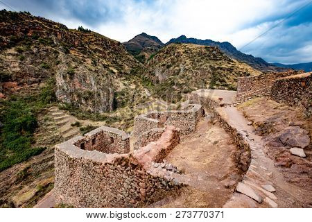 Amazing mountanious Pisac lsndscape with stony constructions in Peru