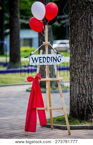 Wedding Decor. Wooden Plaque With The Inscription Wedding. Wood Hand Made Signboard. Wedding Decorat