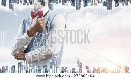 Double Exposure Of Confident And Young Businessman In Smart-casual Wear Smoking Pipe And Modern City