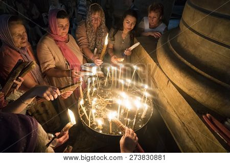 Jerusalem, Israel. 24 October 2018: Believers Lit Candles In The Lords Temple From The Holy Fire In 
