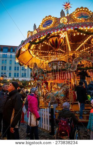 Dresden, Germany - 9.12.2018: Christmas Carousel At Night On Market Striezelmarkt In Dresden In Germ