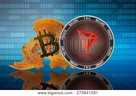Tron Coin Stands In Front Of Cracked Coin Bitcoin On Binary Code Background; Tron Leader; Bitcoin Co