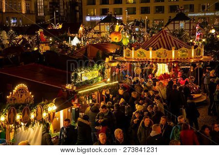 Dresden, Germany - 9.12.2018: People Visit Christmas Market Striezelmarkt In Dresden, Germany. Chris