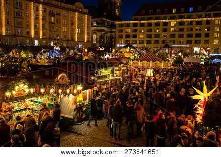 Dresden, Germany - 9.12.2018: People Visit Christmas Market Striezelmarkt In Dresden, Germany. Chris