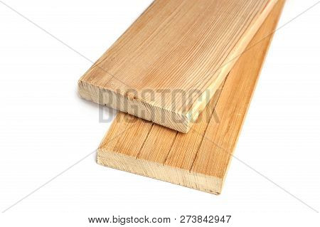 Two Larch Wood Plank Boards Isolated On White Background. Wood Planks Close Up View.