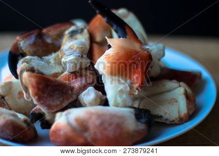 Crab Claws From Atlantic Coast On A Plate In The Black Background