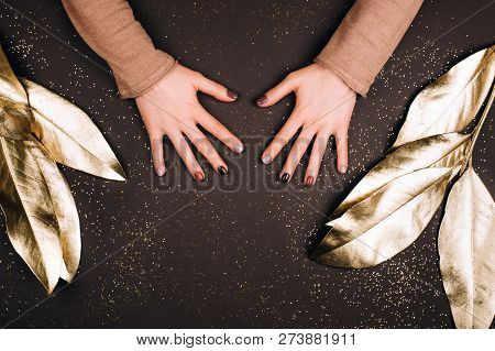 Holiday Beautiful Manicure With Golden Decorations. Dark Tone.
