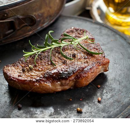 Fresh Juicy Medium Rare Beef Grillsteak. Barbecue Meat Close Up.