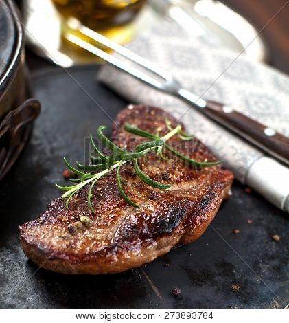 Fresh Juicy Medium Rare Beef Grillsteak. Barbecue Meat Close Up.