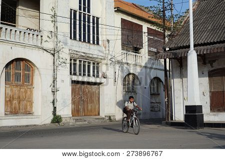 Semarang, Indonesia. November, 25 2018. A Student Cycling Through The Old City Of Semarang.