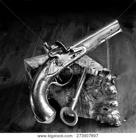 Flintlock Pistol And Jailers Key.