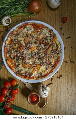 Delicious Italian Vegetarian Pizza With Tomatoes, Mushrooms, Peppers, Corn And Black Olives - Thin P