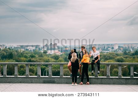 Mogilev, Belarus - August 18, 2018: Young People Teenagers Friends Having Fun Together In City.