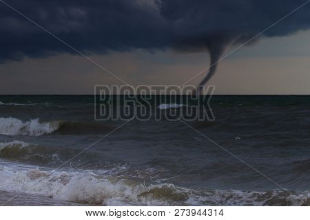 A Hurricane Is About To Batter This Caribbean Beach . The Seas Are Raging And The Skies Show The Tro