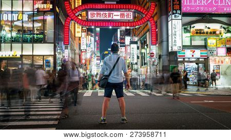 Tokyo, Japan - August 2018: Long Exposure Photo Of An Unidentified Man Standing At Kabukicho In The 