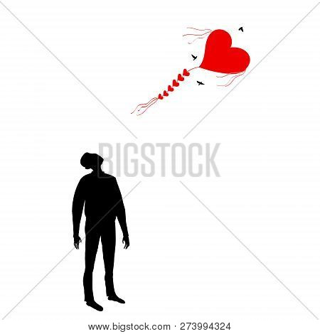 Kite Shaped Like A Heart. Man Looking At A Flying Kite.