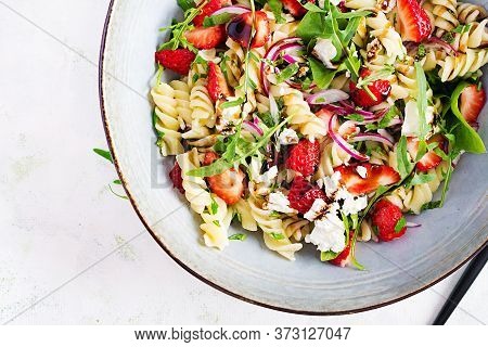 Pasta Salad. Fusilli Pasta - Salad With Strawberry, Feta Cheese, Red Onion And Balsamic Sauce. Top V