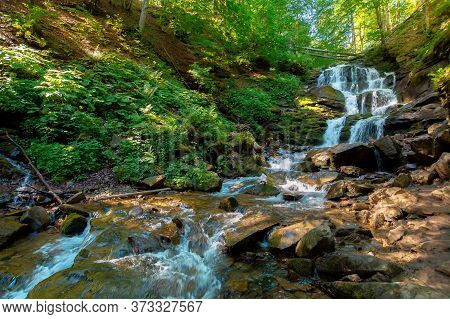 Carpathian Waterfall Shypot In The Morning. Beautiful Nature Scenery. Popular Tourist Attraction