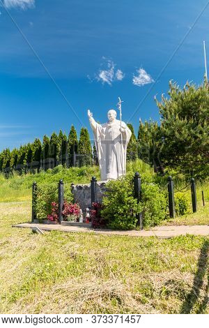 Mikolajki, Poland - June 1, 2020: Statue Of Pope John Paul Ii.