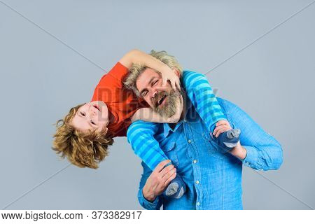 Fathers Day. Family Time. Son And Dad. Family Relatioships. Happy Moments. Son Sit On Dads Shoulders