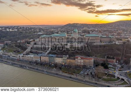 Aerial Drone Shot Of Buda Castle On Hill During Budapest Sunset Hour