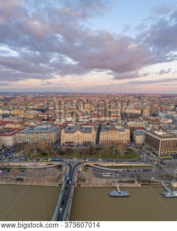 Aerial Drone Shot Of Chain Bridge St. Stephen Basilica By Danube River In Budapest Sunset