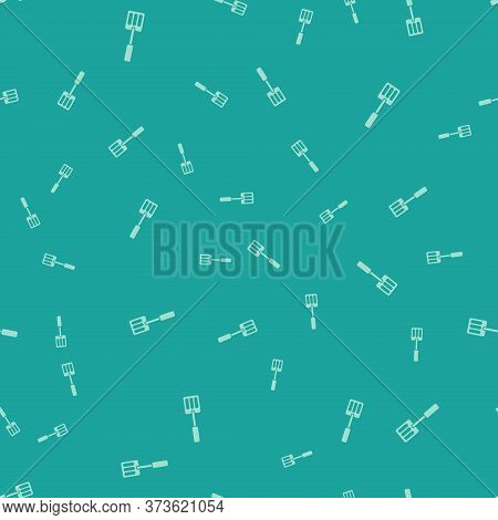 Green Spatula Icon Isolated Seamless Pattern On Green Background. Kitchen Spatula Icon. Bbq Spatula 