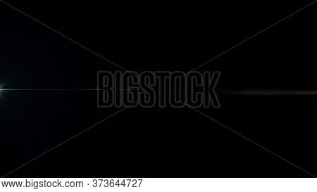 Anamorphic Lens Flare From A Photo Camera Lens. Anamorphic Background.