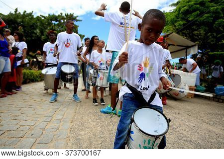 Salvador, Bahia / Brazil - October 15, 2017: Child Is Seen Playing A Percussion Instrument In The Me