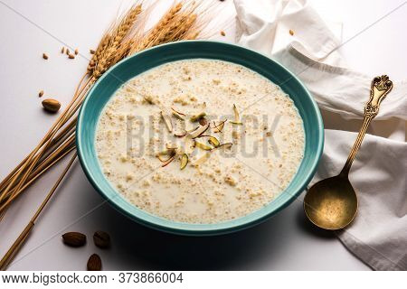 Daliya Kheer Or Dalia Payasam - Broken Or Cracked Wheat And Milk Porridge With Sugar Cooked In India