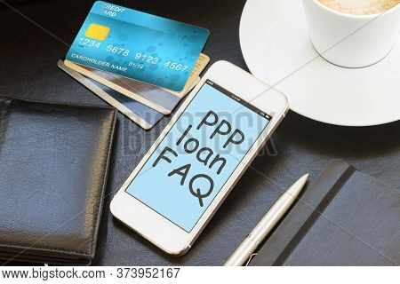 Paycheck Protection Program Concept With Phone And Credit Cards And Wallet